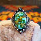  Sonoran Gold Turquoise stone in a framed design, set in sterling silver. Made by Lowell Draper, this ring is size 10, font view.