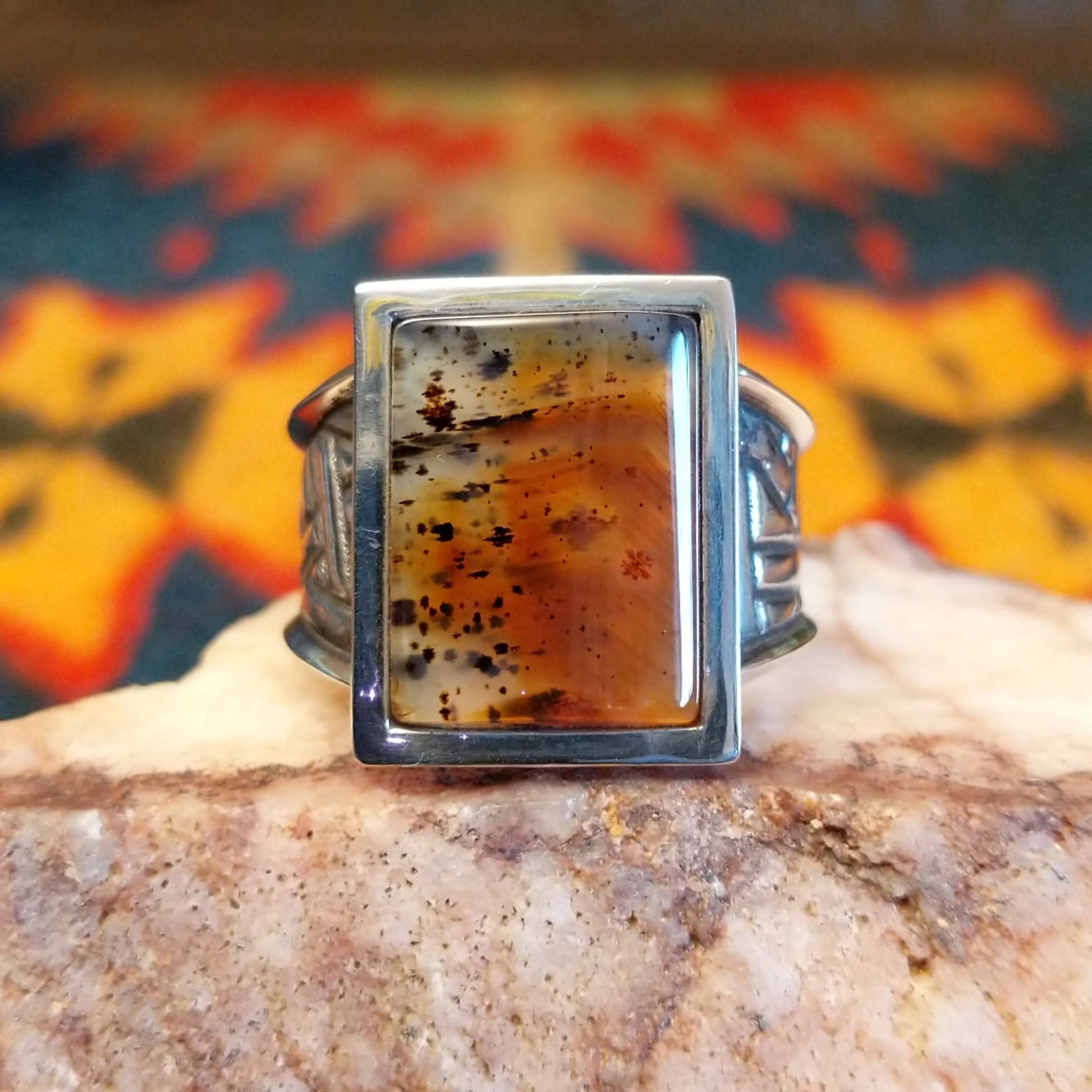 Size 11 Navajo agate ring features a striking rectangular stone set in sterling silver. Front view