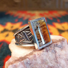 Size 11 Navajo agate ring features a striking rectangular stone set in sterling silver.  Side view detail
