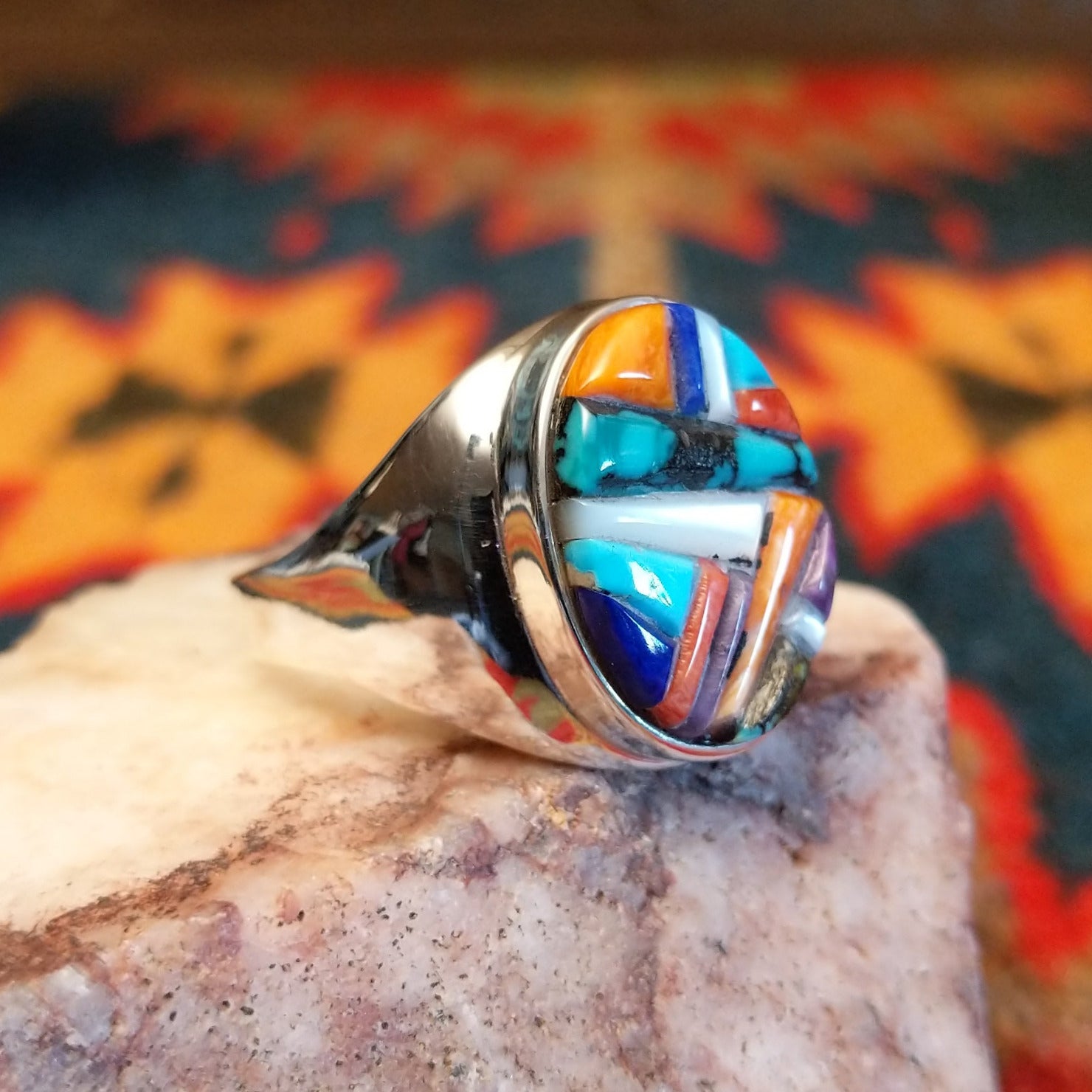 Size 12.5 Navajo multistone, cobblestone style ring by J.Y. features a vibrant mosaic of hand-cut stones set in sterling silver.  Side view