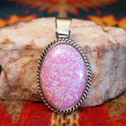  Pink Manmade Opal Oval Pendant by Jan Mariano with classic rope design.  Front view