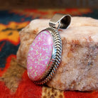  Pink Manmade Opal Oval Pendant by Jan Mariano with classic rope design.    Side view
