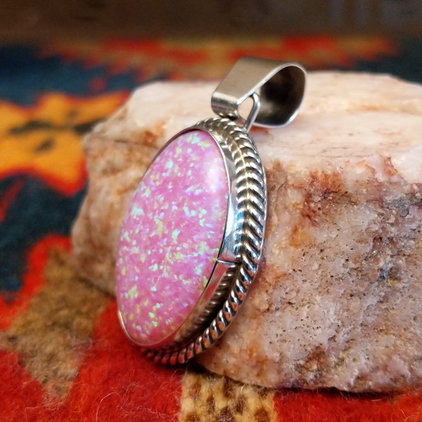  Pink Manmade Opal Oval Pendant by Jan Mariano with classic rope design.    Side view