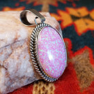  Pink Manmade Opal Oval Pendant by Jan Mariano with classic rope design.    Side view