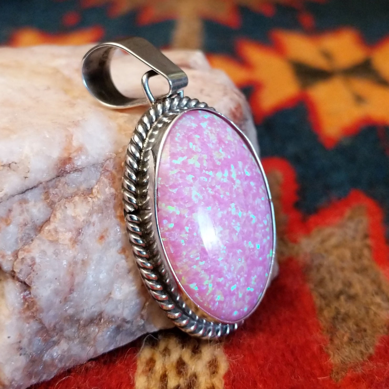  Pink Manmade Opal Oval Pendant by Jan Mariano with classic rope design.    Side view