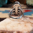 Sterling silver navette ring by Verdy Jake featuring a deep blue lapis stone in a classic Southwestern design.  Underside view.