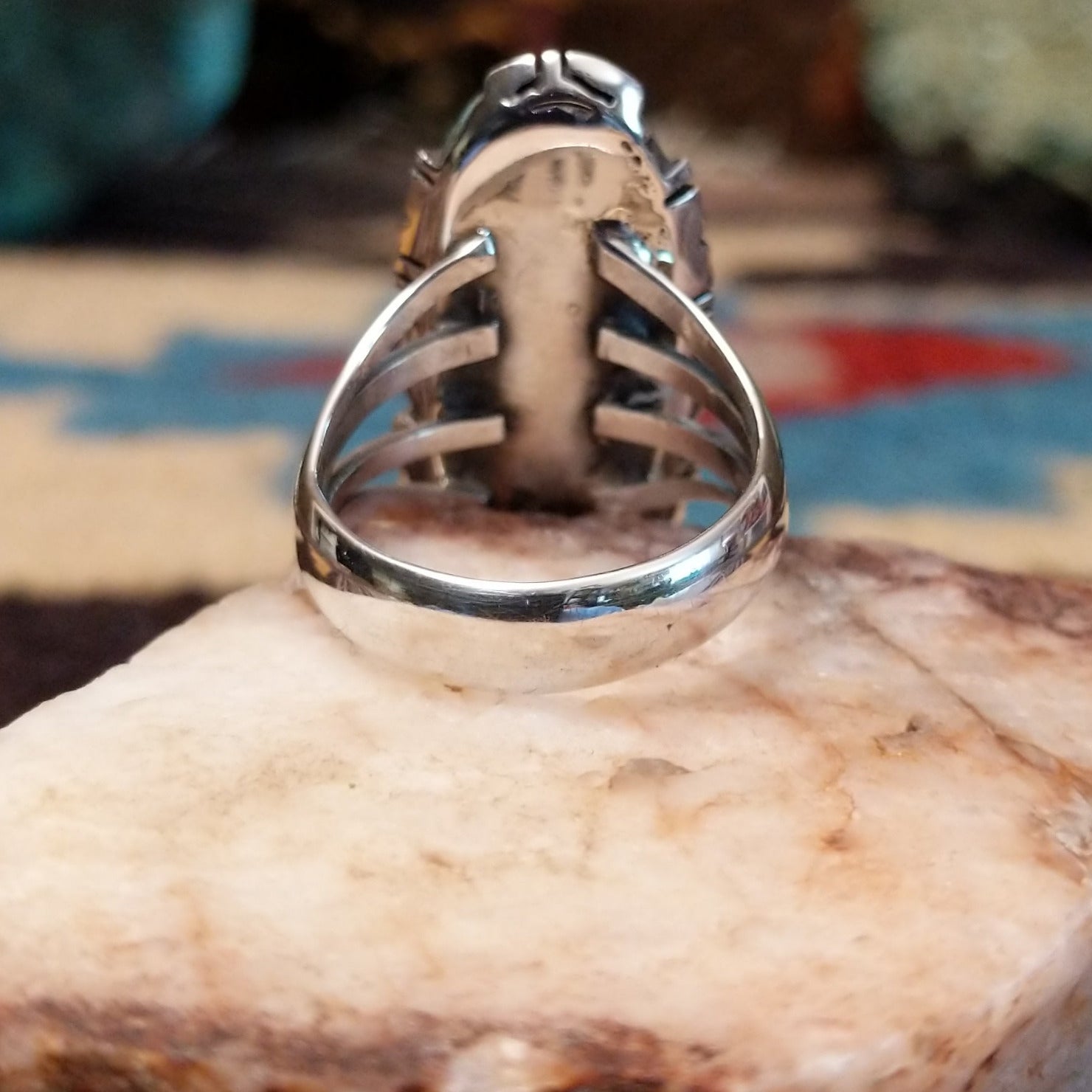 Sterling silver navette ring by Verdy Jake featuring a deep blue lapis stone in a classic Southwestern design.  Underside view.