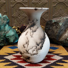 Medium flared white horsehair pottery vase by Jim Calhoun with a polished finish, smoky organic patterns, and a softly flared rim in Southwestern style.