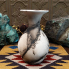 Medium flared white horsehair pottery vase by Jim Calhoun with a polished finish, smoky organic patterns, and a softly flared rim in Southwestern style.