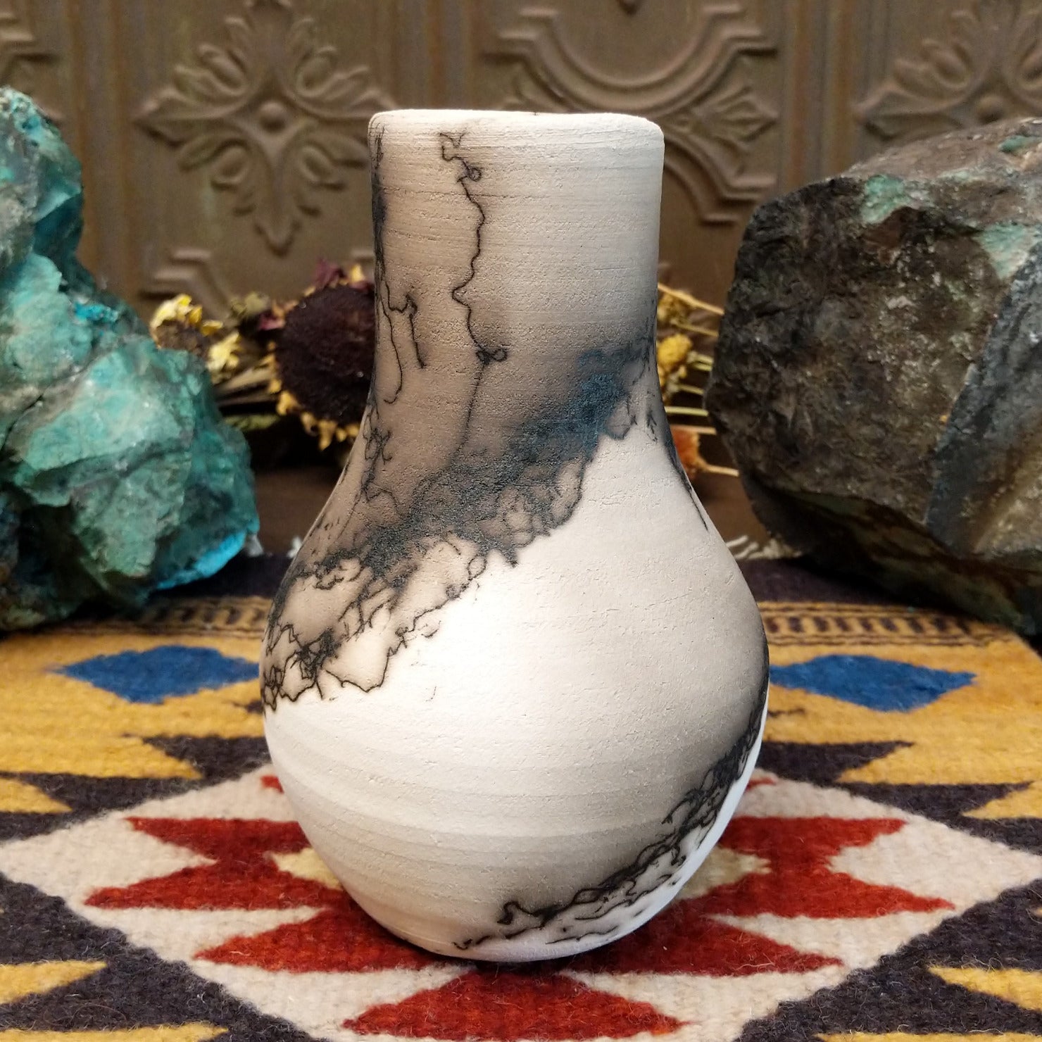 Medium-sized white horsehair chiminea-style vase by local artist Jim Calhoun with smoky natural markings, polished finish, and handcrafted Southwestern design.