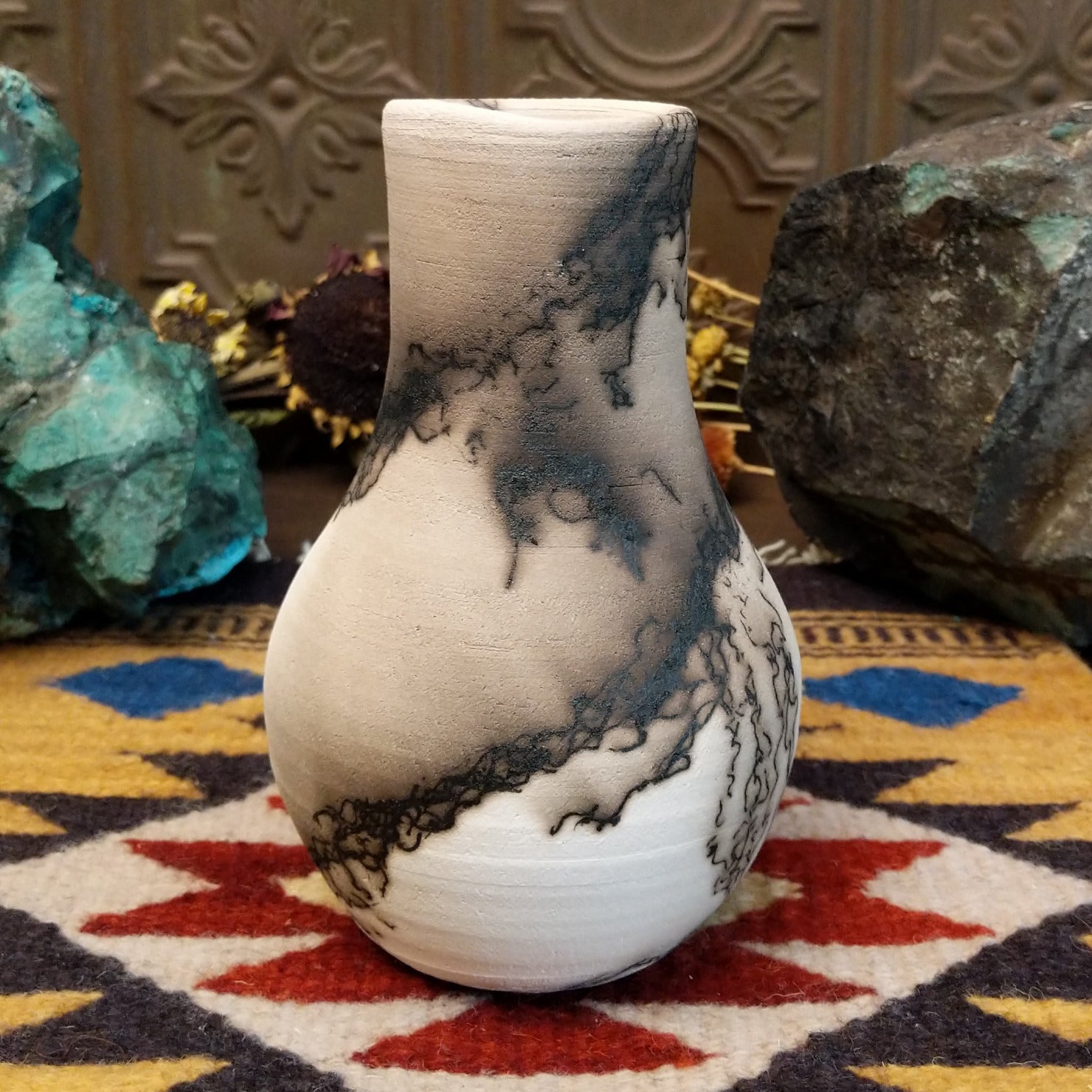Medium-sized white horsehair chiminea-style vase by local artist Jim Calhoun with smoky natural markings, polished finish, and handcrafted Southwestern design.