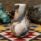 Medium-sized white horsehair chiminea-style vase by local artist Jim Calhoun with smoky natural markings, polished finish, and handcrafted Southwestern design.