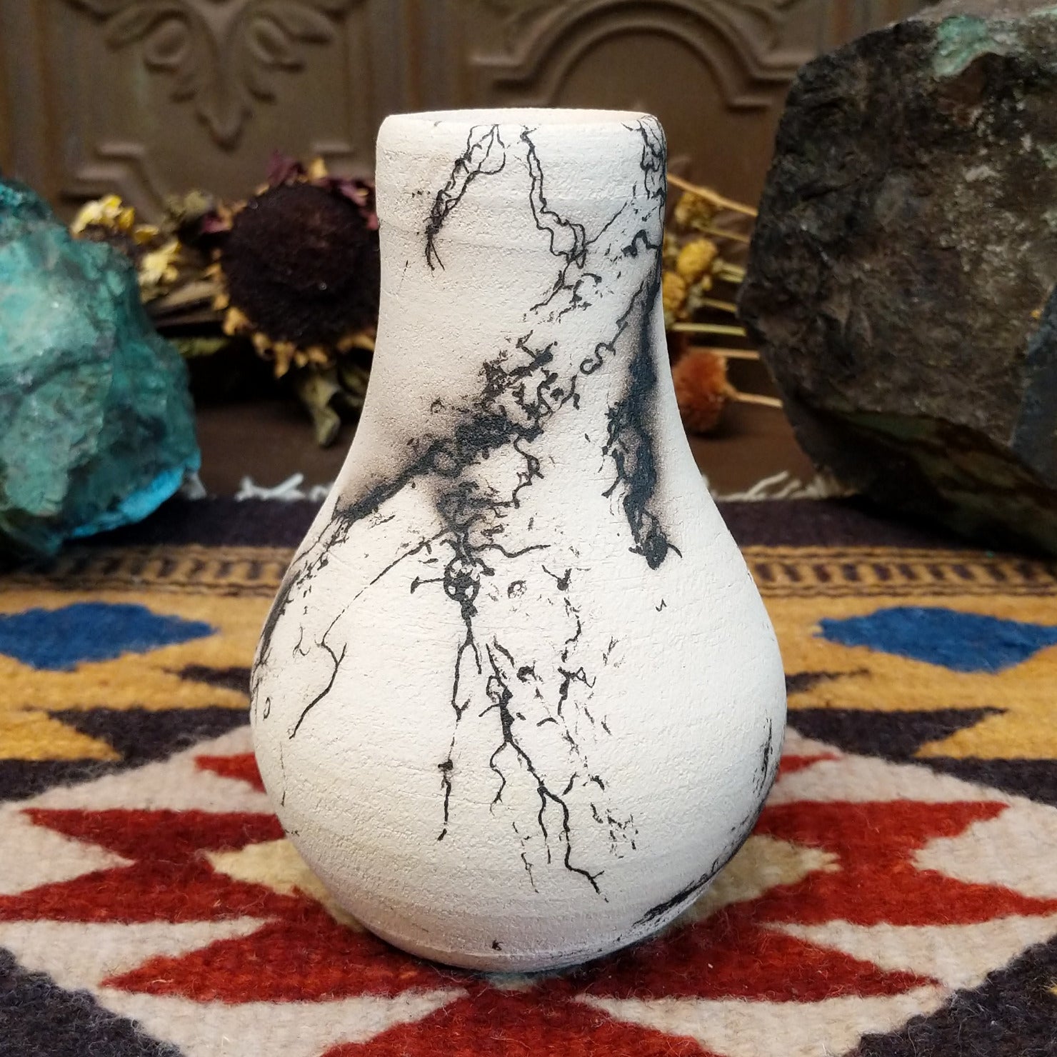 Small chiminea-style white horsehair pottery vase by local artisan Jim Calhoun with smoky natural patterns, polished finish, and handcrafted Southwestern design.