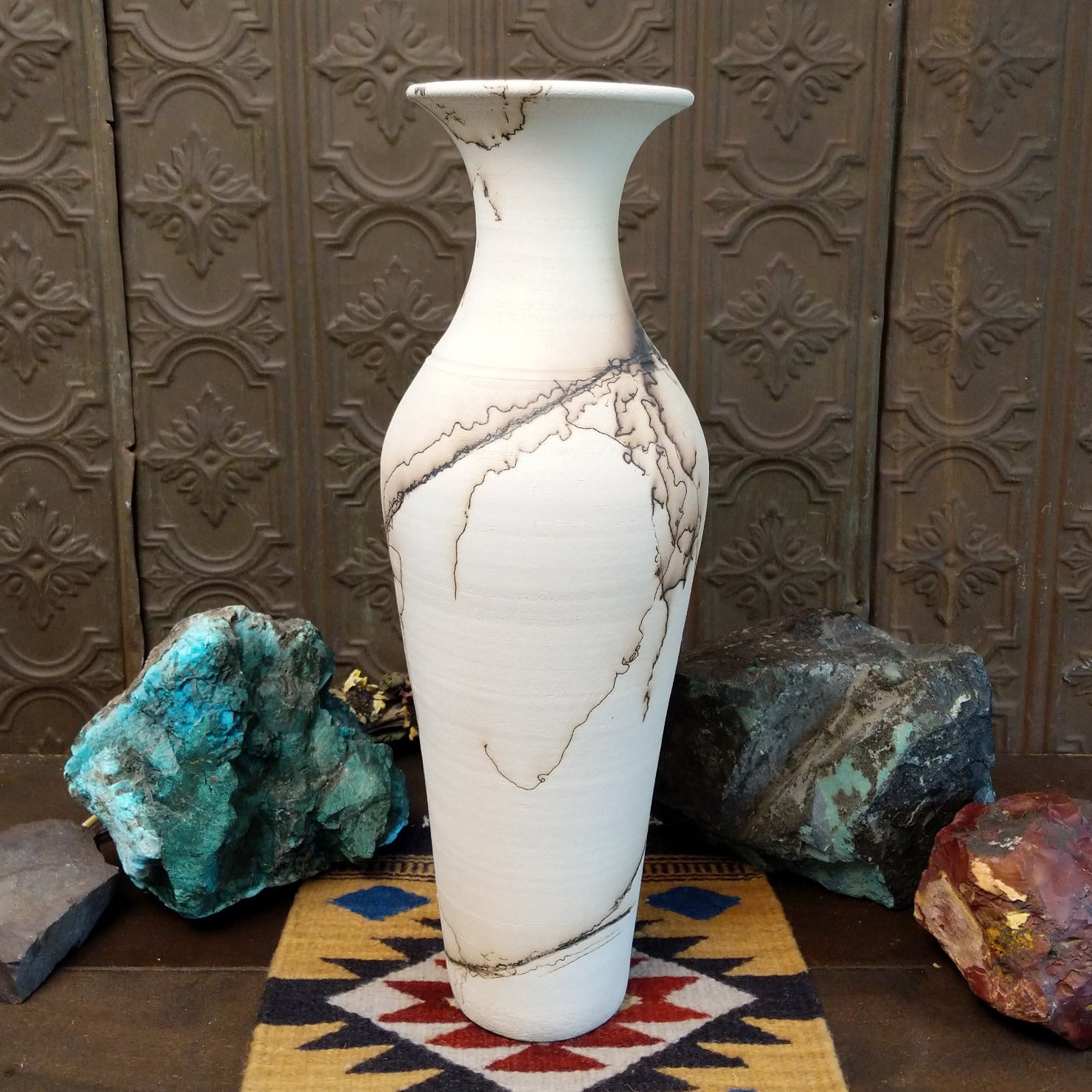 Tall flared white horsehair pottery vase by local artisan Jim Calhoun featuring smoky black organic patterns, polished white finish, and handcrafted Southwestern design.
