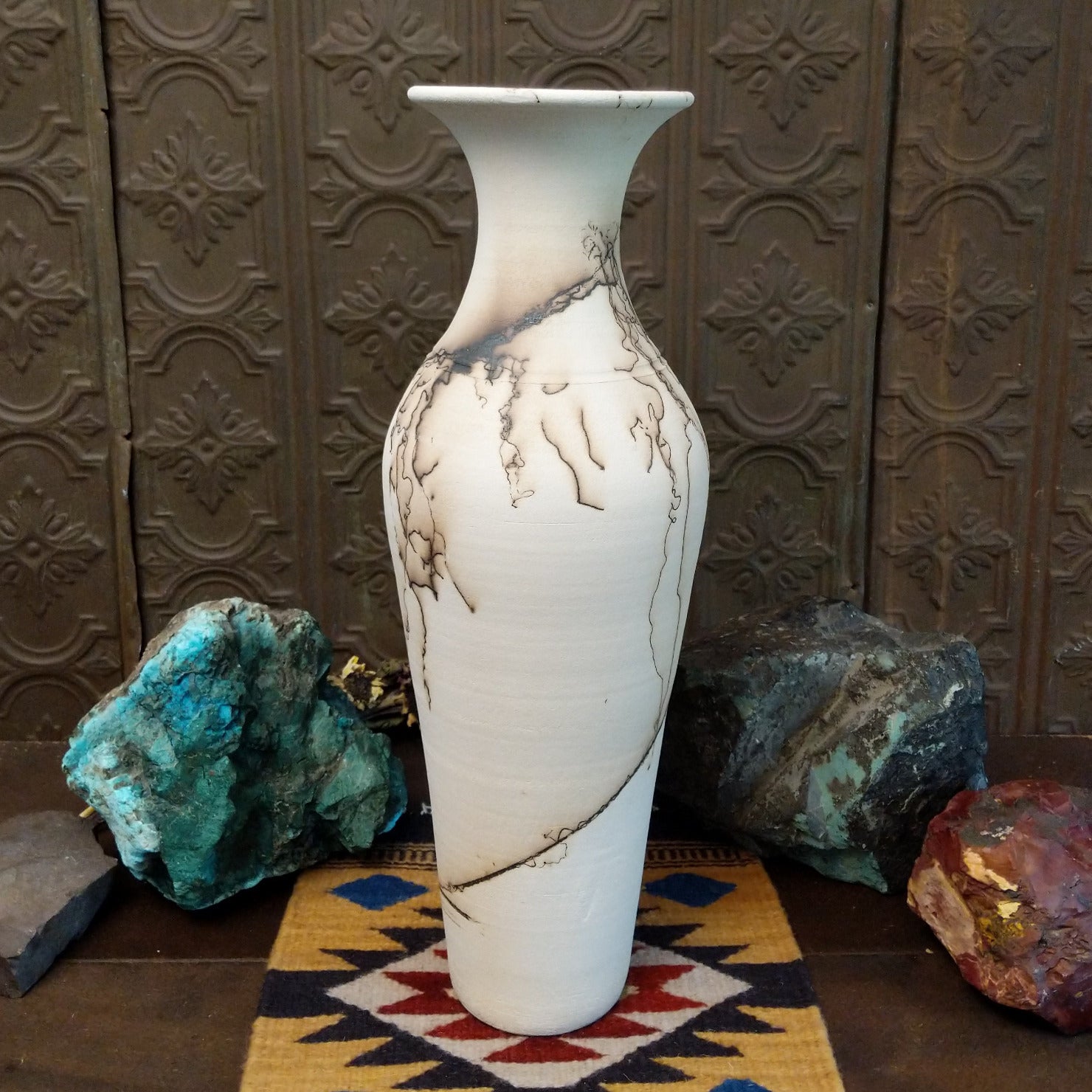 Tall flared white horsehair pottery vase by local artisan Jim Calhoun featuring smoky black organic patterns, polished white finish, and handcrafted Southwestern design.