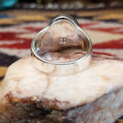 Handcrafted sterling silver oval ring by Eugene Davy featuring lapis, turquoise, charoite, mother of pearl, and gaspeite in a multistone Southwestern design.  Underside view.