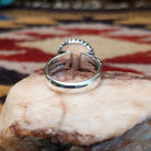 Handcrafted sterling silver circle ring by Artie Yellowhorse featuring a Sonoran Gold turquoise stone in a polished Southwestern Native American design.  Underside view.