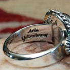Handcrafted sterling silver circle ring by Artie Yellowhorse featuring a Sonoran Gold turquoise stone in a polished Southwestern Native American design.  Artisan stamp on band.