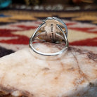 Handcrafted sterling silver oval ring by Artie Yellowhorse featuring a deep blue lapis stone in a polished Southwestern Native American design.  Underside view.