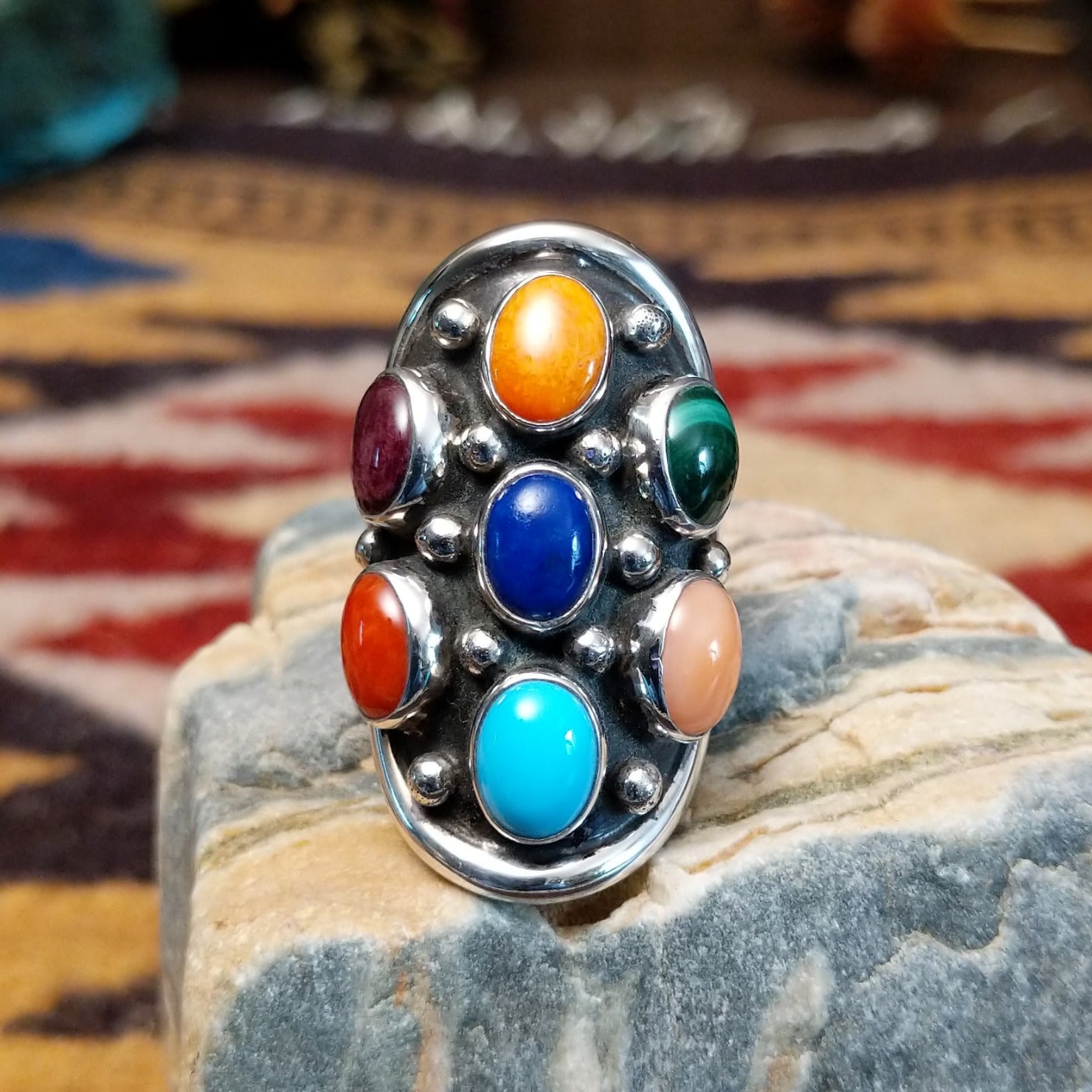 Handcrafted sterling silver multistone ring by Bernice Bonney featuring a colorful arrangement of natural gemstones in a traditional Southwestern Native American design.