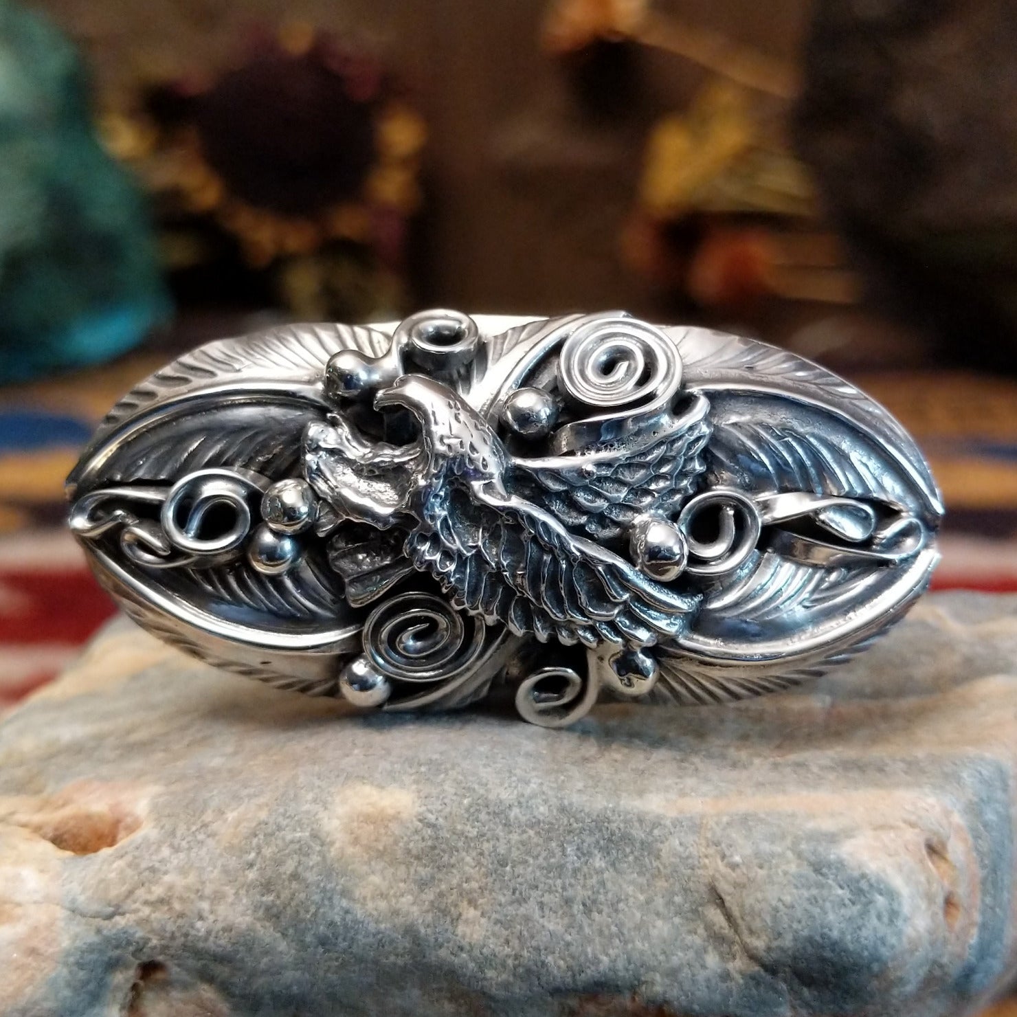 Handcrafted sterling silver ring by Navajo artist Allen Chee featuring a detailed eagle design in a traditional Southwestern Native American style.