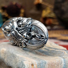 Handcrafted sterling silver ring by Navajo artist Allen Chee featuring a detailed eagle design in a traditional Southwestern Native American style.  Side view.