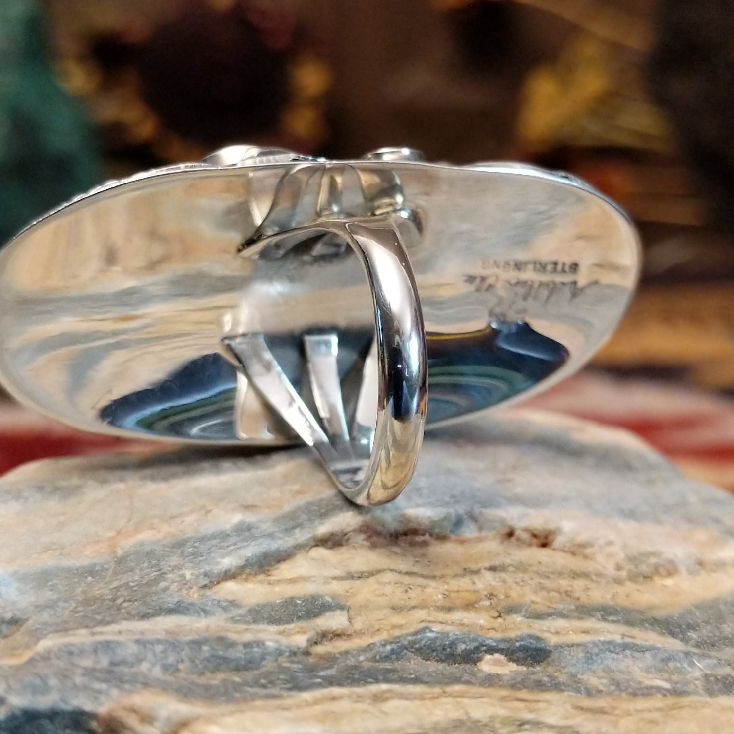 Handcrafted sterling silver ring by Navajo artist Allen Chee featuring a detailed eagle design in a traditional Southwestern Native American style.  Underside view.