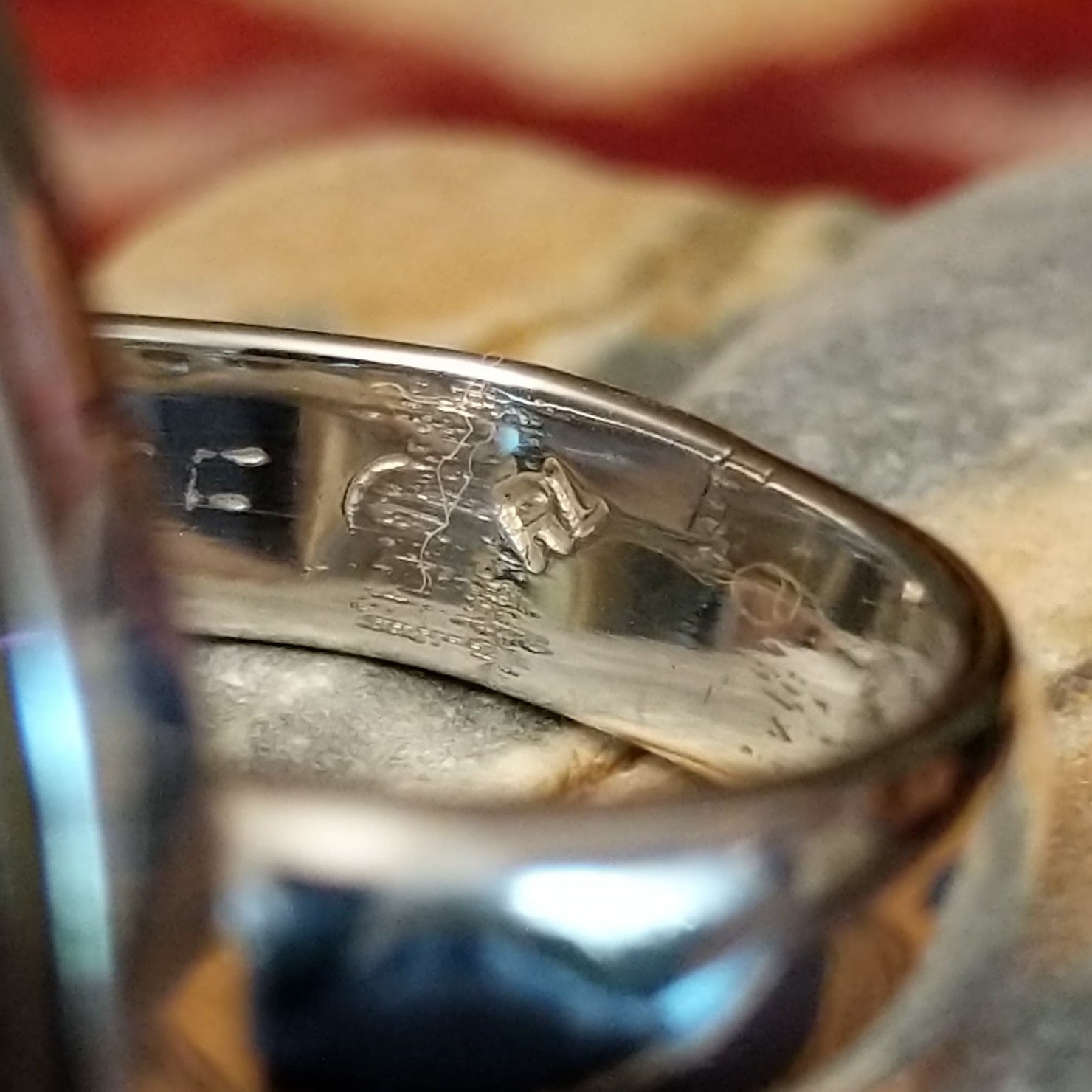 Handcrafted Navajo sterling silver teardrop ring by R.L. featuring colorful multistone inlay work in a traditional Southwestern Native American design.  Artisan Stamp.