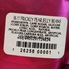 Colorful prickly pear jelly beans displayed in a pile, featuring vibrant pink and purple hues inspired by the sweet fruit of the prickly pear cactus. 