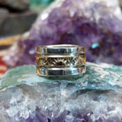 Handcrafted sterling silver and 14K gold band ring by Marc Antia featuring a stamped gold center with polished silver edges in a Southwestern Native American design.