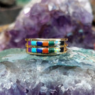 Two row multistone inlay ring in 14K yellow gold by Tom Billy, featuring colorful stone inlay arranged in parallel rows within a polished gold band.