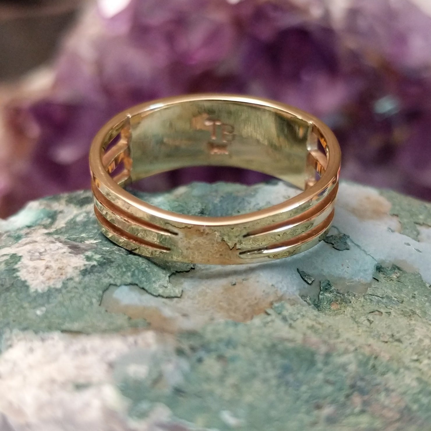 Two row multistone inlay ring in 14K yellow gold by Tom Billy, featuring colorful stone inlay arranged in parallel rows within a polished gold band.  Underside view.
