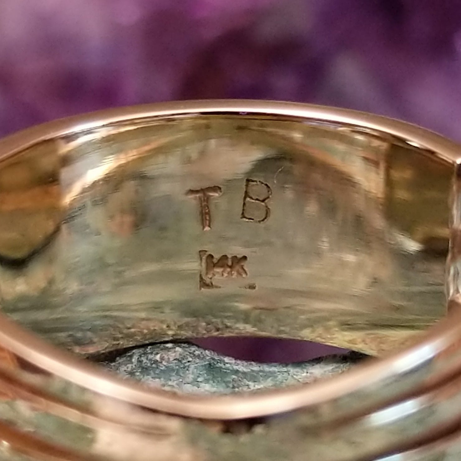 Three row multistone inlay ring in 14K yellow gold by Tom Billy, featuring colorful stone inlay arranged in three parallel rows within a polished gold band.  Artisan and 14K gold stamp.