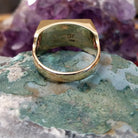 Multistone inlay ring in 14K yellow gold by Steve Francisco, featuring colorful stone inlay patterns set within a polished gold band.  Underside view.