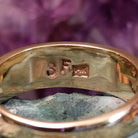 Multistone tiled inlay ring in 14K yellow gold by Steve Francisco, featuring a structured mosaic of individually cut stones set within a polished gold band.  Artisan and 14K gold stamp.
