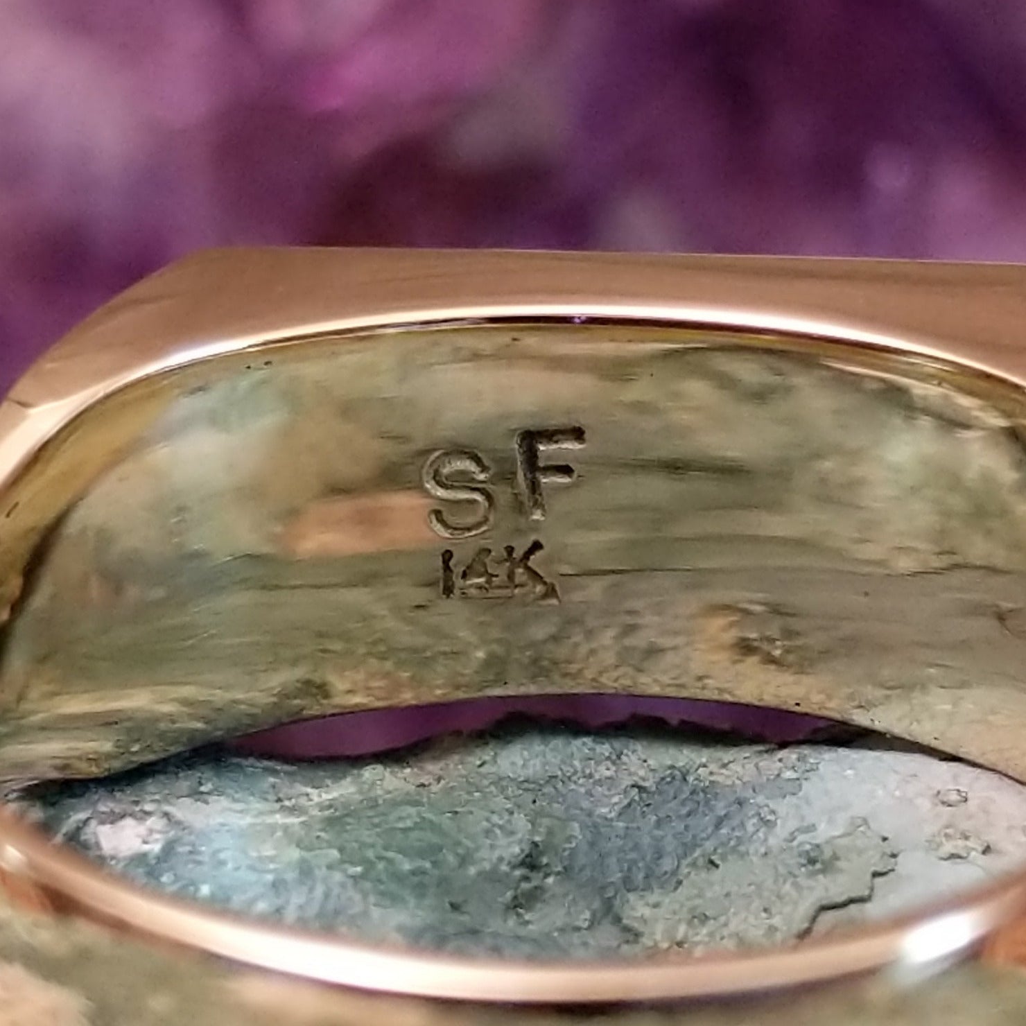 Multistone inlay ring in 14K yellow gold by Steve Francisco, featuring a vibrant mosaic of carefully fitted natural stones set within a polished gold band.  Artisan and 14K gold stamp.
