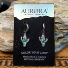 Aurora cactus earrings by LeightWorks, featuring sparkling faceted crystal cactus designs with brilliant light-reflecting detail and a lightweight Southwestern-inspired style.