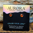 Aurora halo crystal stud earrings by LeightWorks, featuring faceted crystals surrounded by a sparkling halo setting with brilliant light-reflecting detail.
