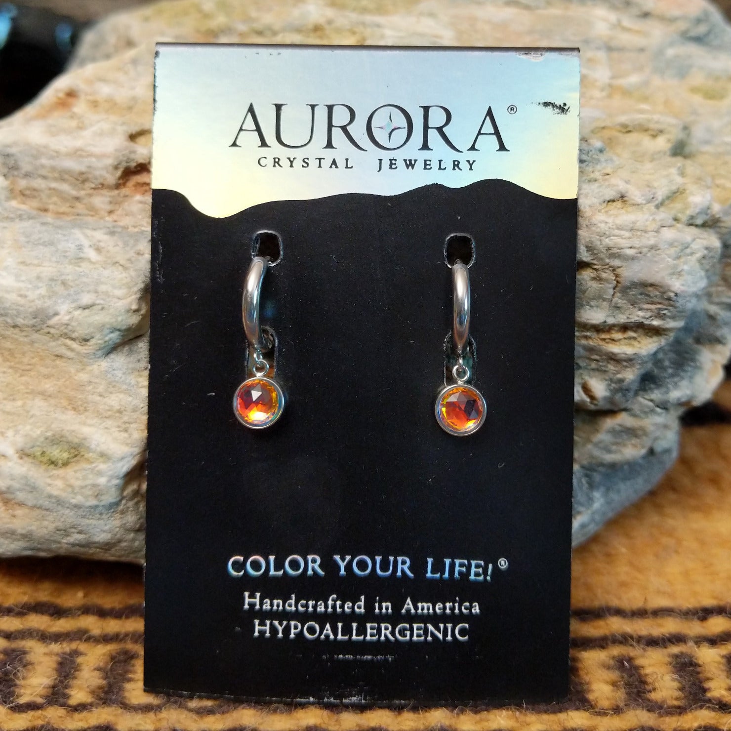 Aurora lunar hoop earrings by LeightWorks, featuring sparkling faceted crystal accents set within elegant lightweight hoops with brilliant light-reflecting detail.
