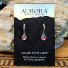 Aurora lunar hoop earrings by LeightWorks, featuring sparkling faceted crystal accents set within elegant lightweight hoops with brilliant light-reflecting detail.