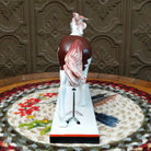 "Medicine Hat" collectible pony by The Trail of Painted Ponies, featuring intricate hand-painted designs, vibrant colors, and traditional Western-inspired artwork.  Rear view.