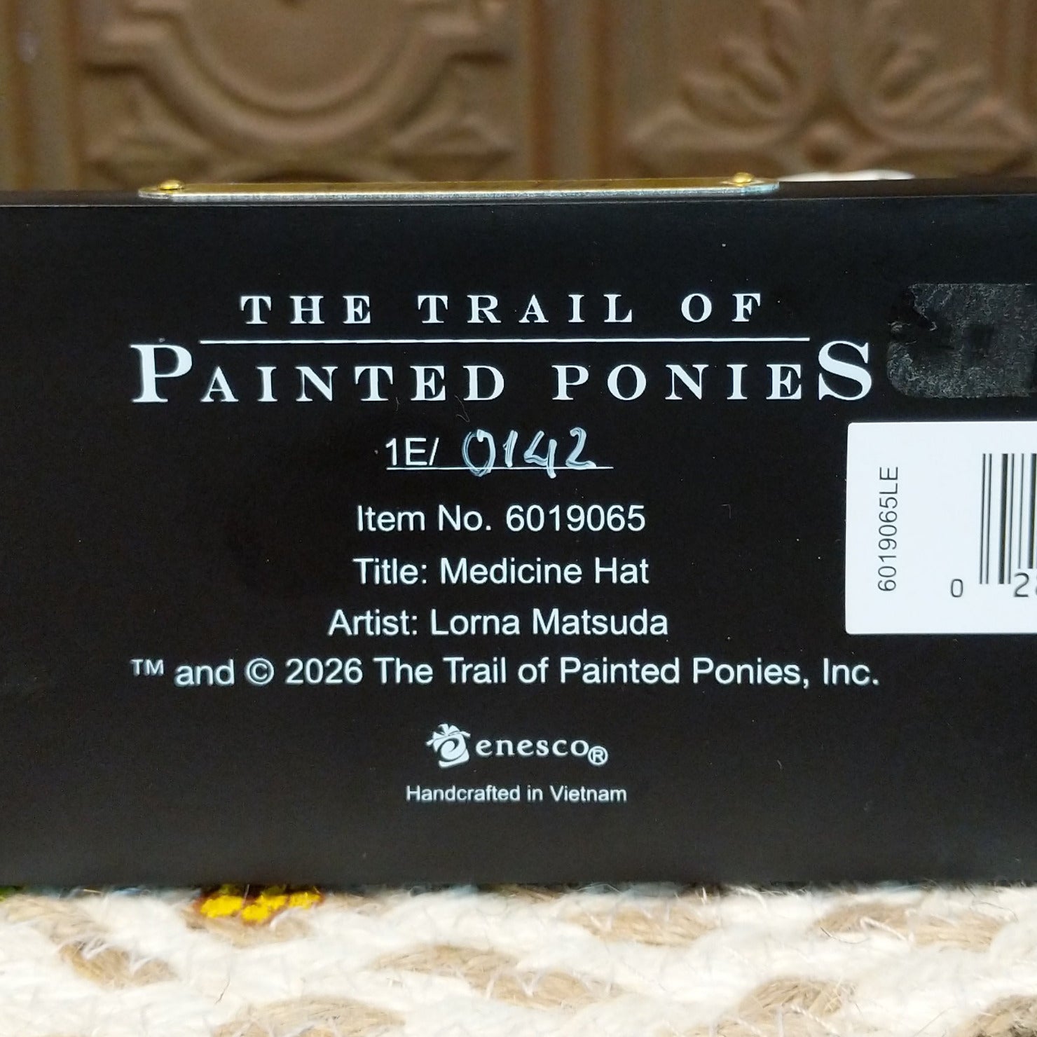 "Medicine Hat" collectible pony by The Trail of Painted Ponies, featuring intricate hand-painted designs, vibrant colors, and traditional Western-inspired artwork.  Production number.