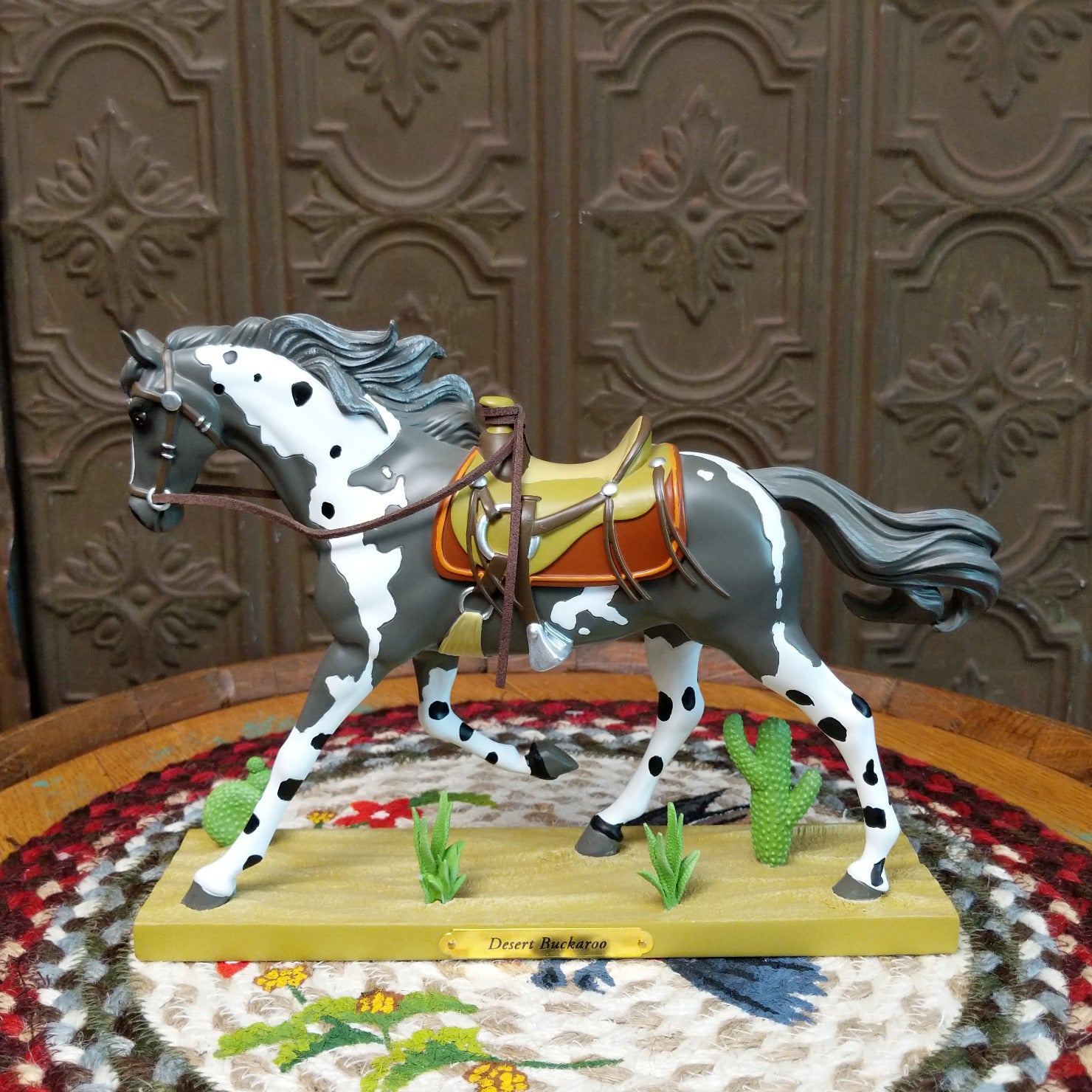 "Desert Buckaroo" collectible pony by The Trail of Painted Ponies, featuring detailed hand-painted desert-inspired artwork, Western themes, and vibrant colors.