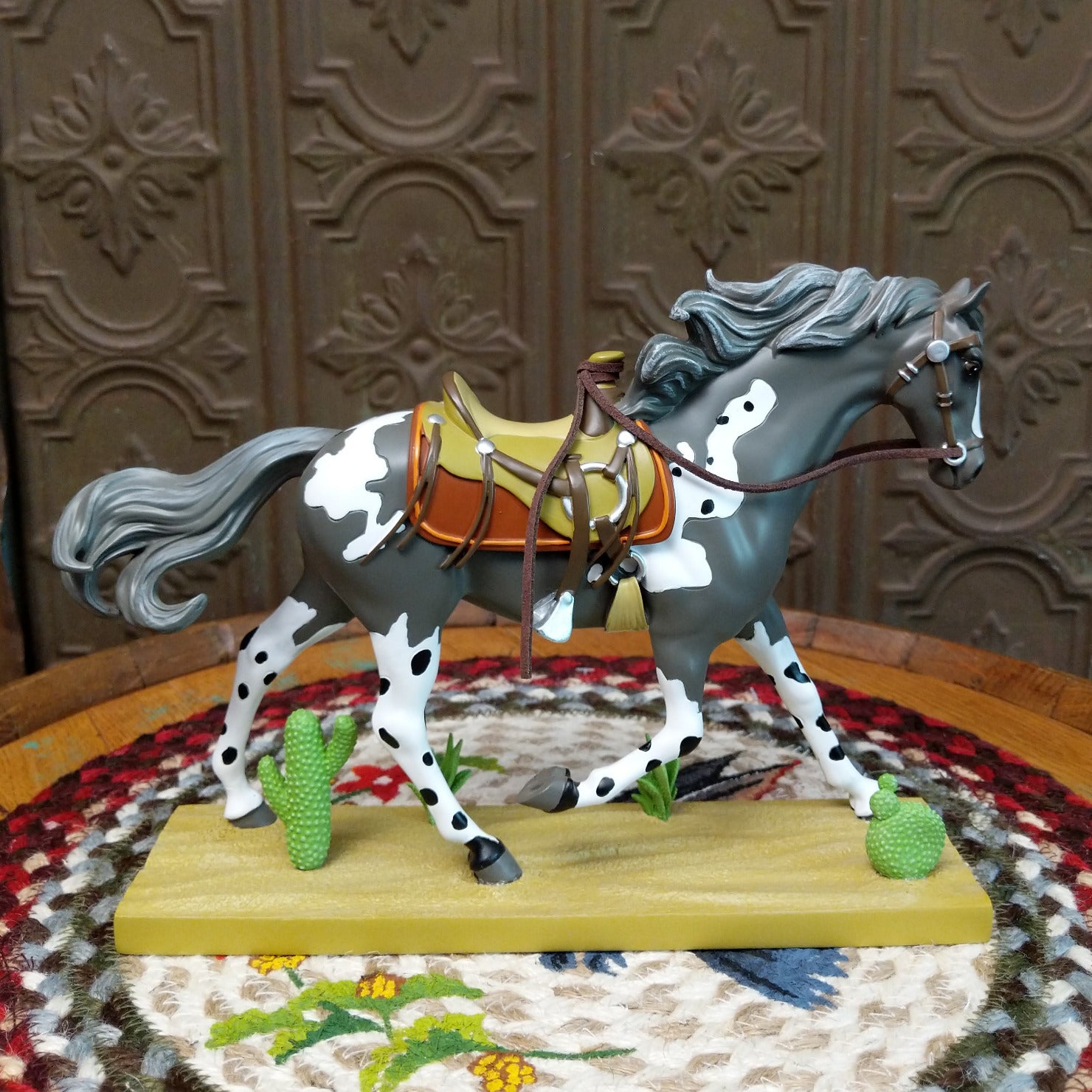 "Desert Buckaroo" collectible pony by The Trail of Painted Ponies, featuring detailed hand-painted desert-inspired artwork, Western themes, and vibrant colors.