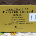 "Desert Buckaroo" collectible pony by The Trail of Painted Ponies, featuring detailed hand-painted desert-inspired artwork, Western themes, and vibrant colors.  Production number.