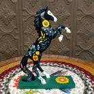 "Wildflower" collectible pony by The Trail of Painted Ponies, featuring detailed hand-painted floral artwork, vibrant colors, and nature-inspired design elements.