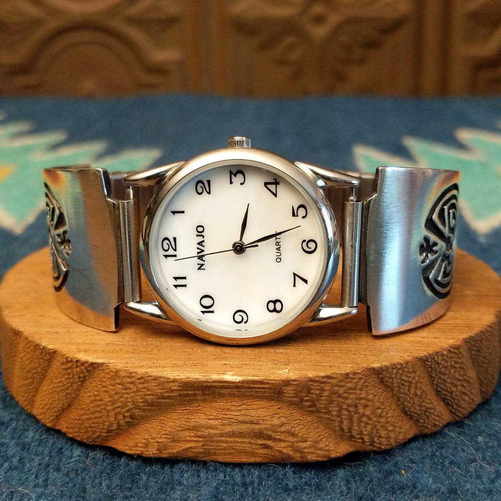 Sterling silver watch with the man in the maze motif and semi-adjustable bracelet.