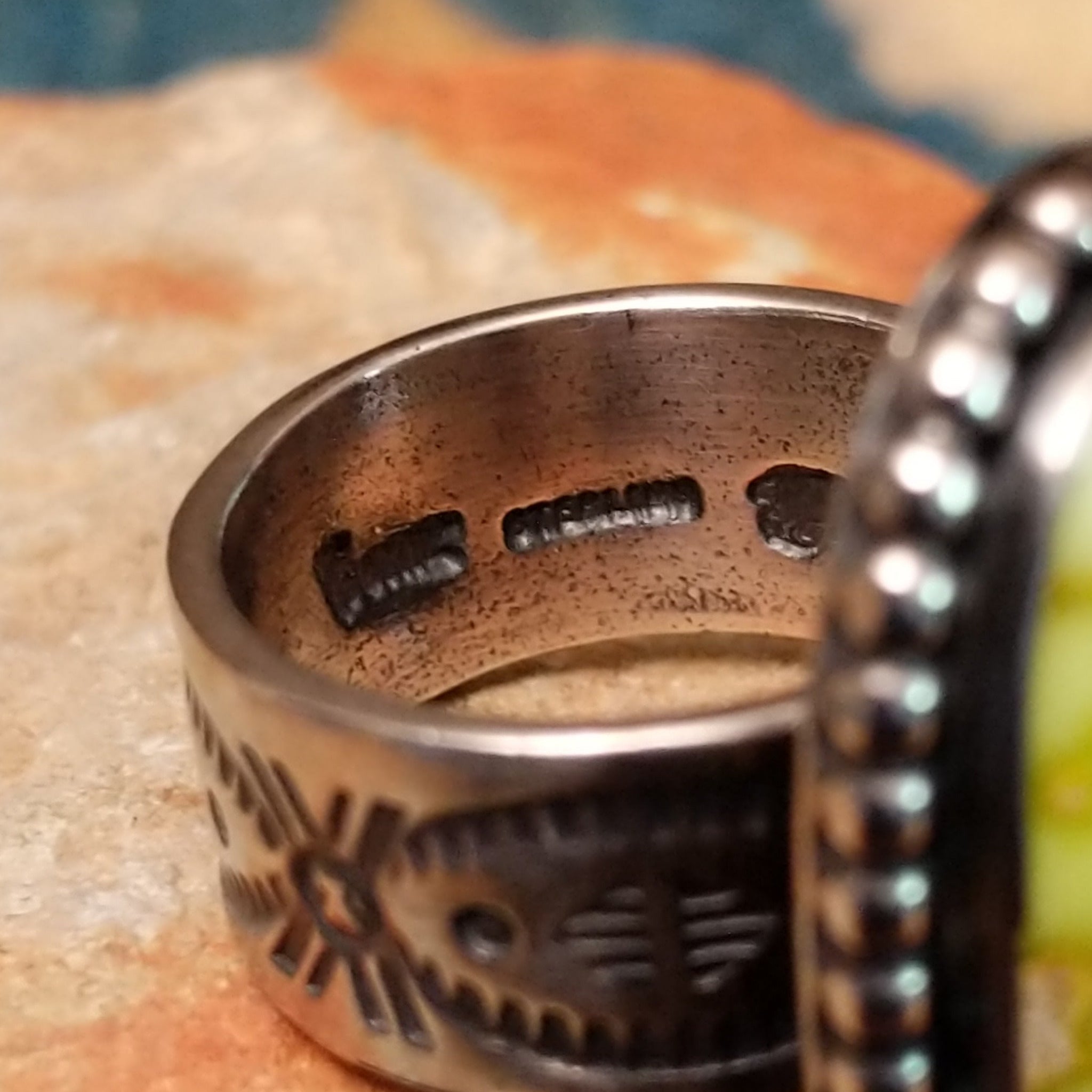 Handcrafted sterling silver Palomino Variscite oval ring by Raymond Coriz, featuring a natural green and white variscite gemstone with a beaded bezel; artisan and Sterling Silver stamp.