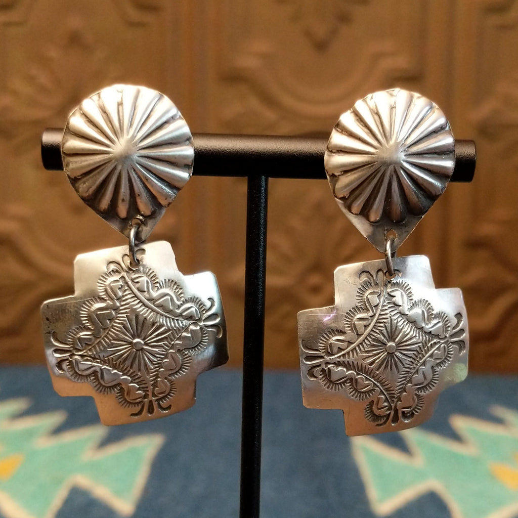 Sterling silver paths crossed earrings with intricate geometric patterns.
