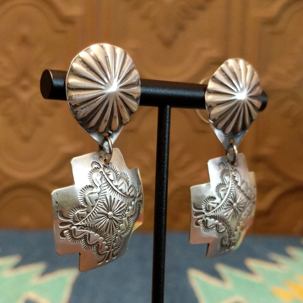 Sterling silver paths crossed earrings with intricate geometric patterns.